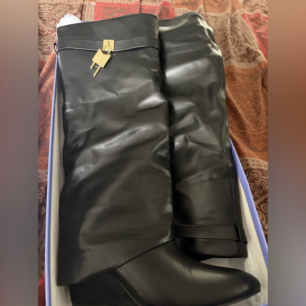 Black Leather Boots with Gold Lock Detail